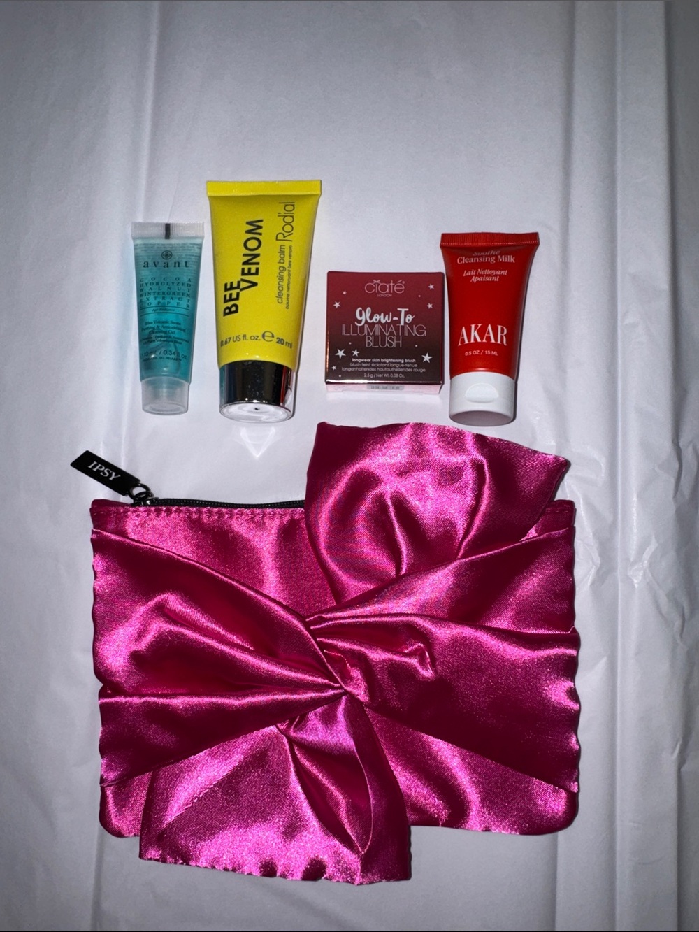 ipsy Hot Pink Satin Bow Marilyn Monroe Makeup Bag with Assorted Skincare Samples
